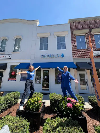 Smiling Prime IV Hydration team members welcoming guests outside the Bluffton, SC location